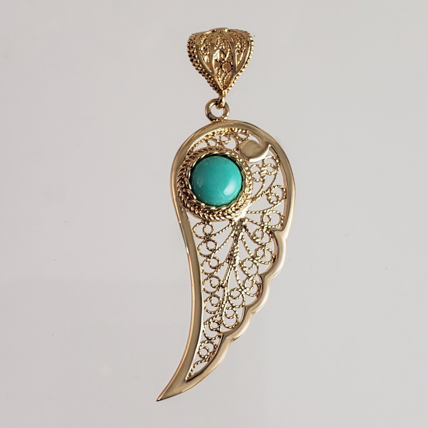 Filigree Angel Wing Pendant with Turquoise Stone
