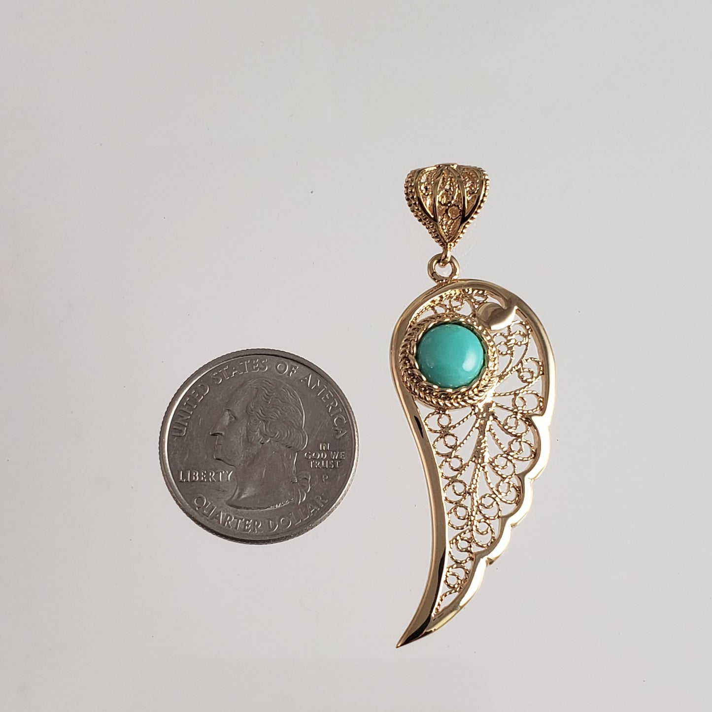 Filigree Angel Wing Pendant with Turquoise Stone