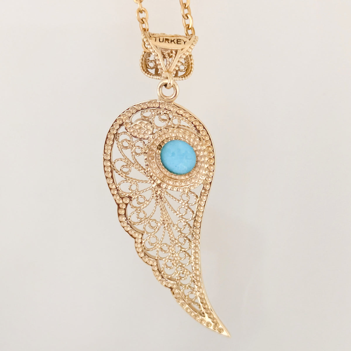 Filigree Angel Wing Pendant with Turquoise