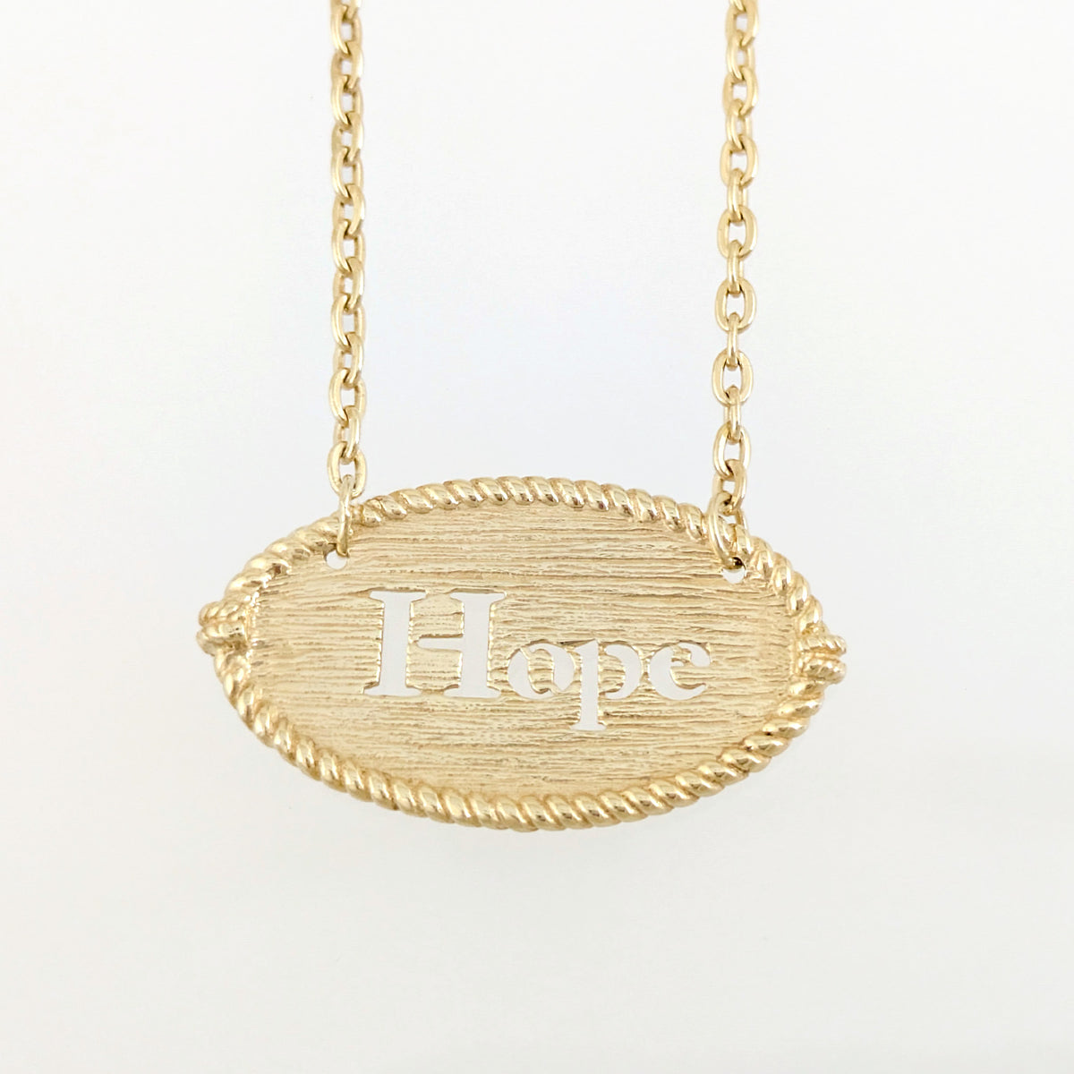 Oval Hope Cutout Necklace with Textured Pendant
