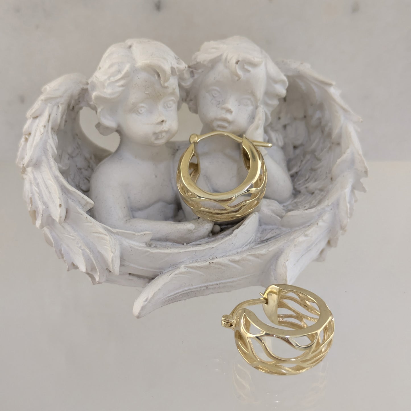 Rounded Openwork Hoop Earrings with Branch-Inspired Pattern