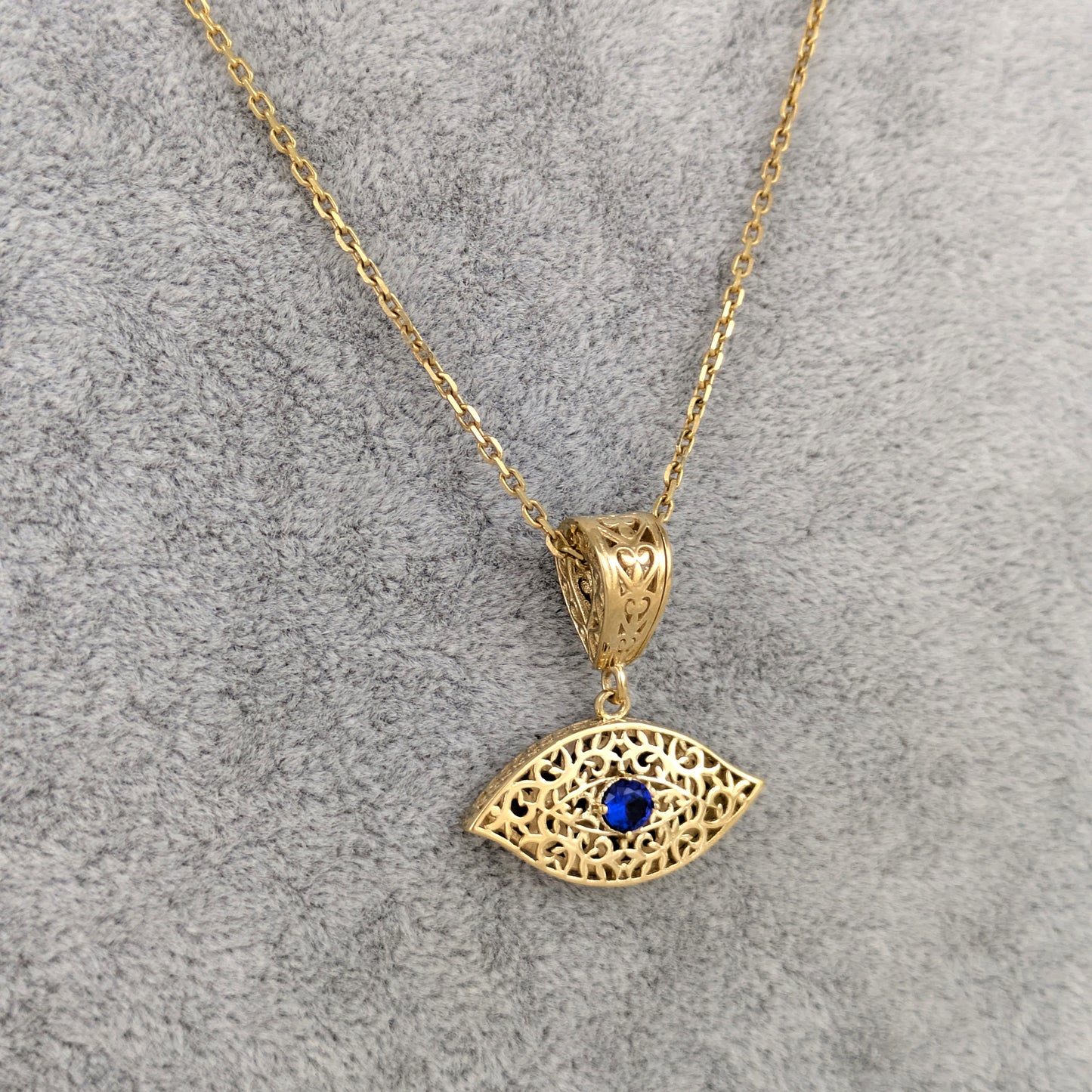 Filigree Evil Eye Pendant with Blue Crystal