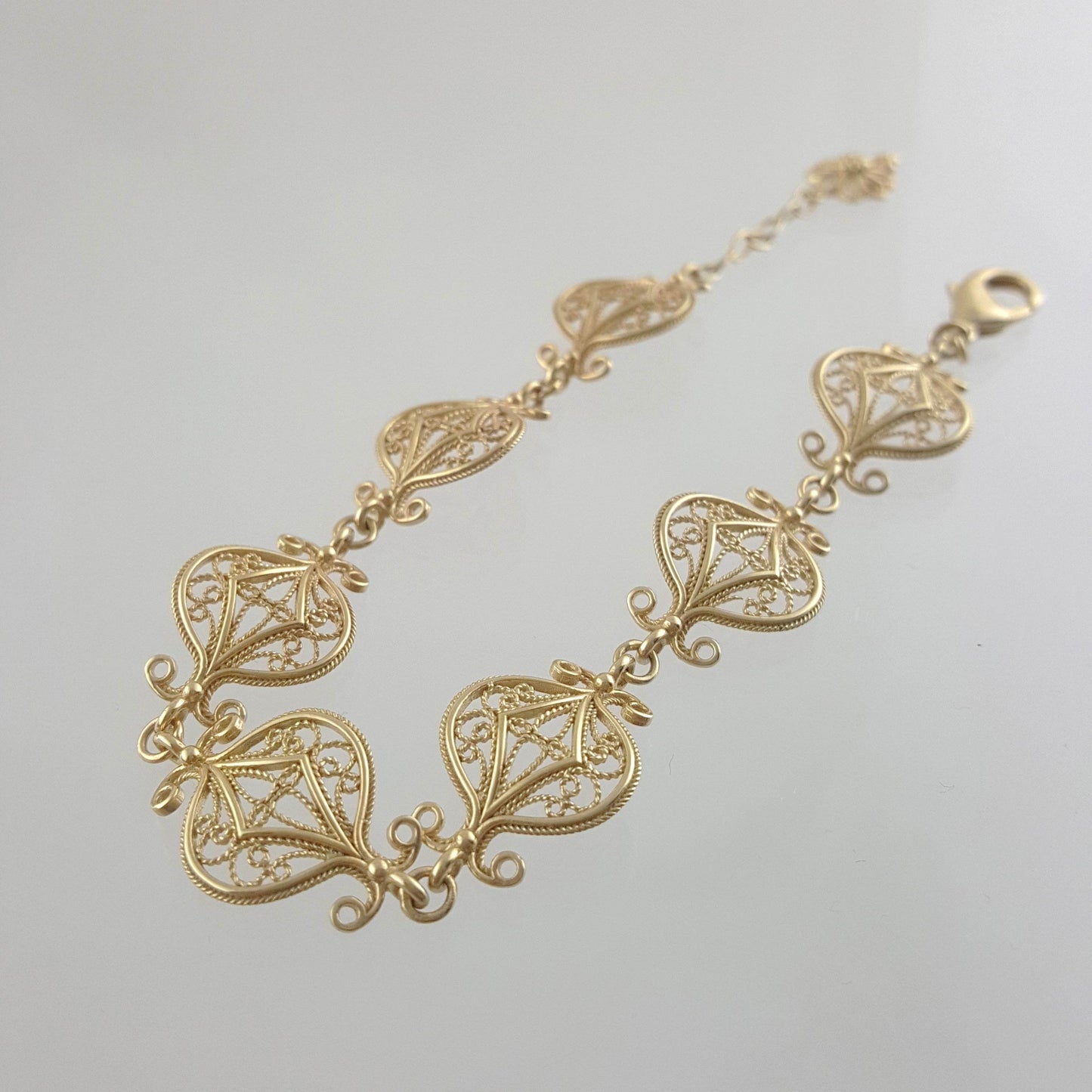 Gold Plated Bronze Filigree Bracelet with Elegant Floral Design - TurkishBling