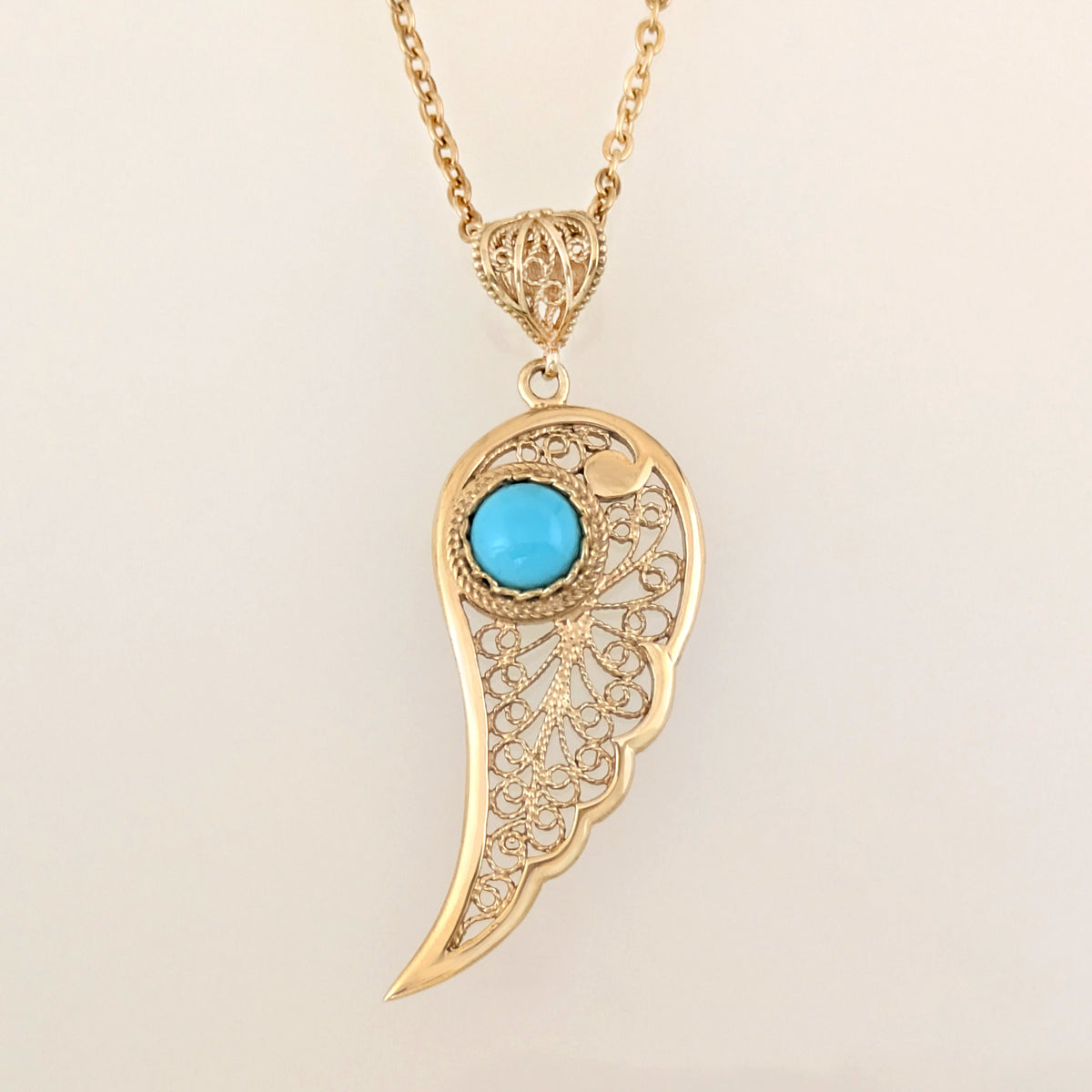 Filigree Angel Wing Pendant with Turquoise