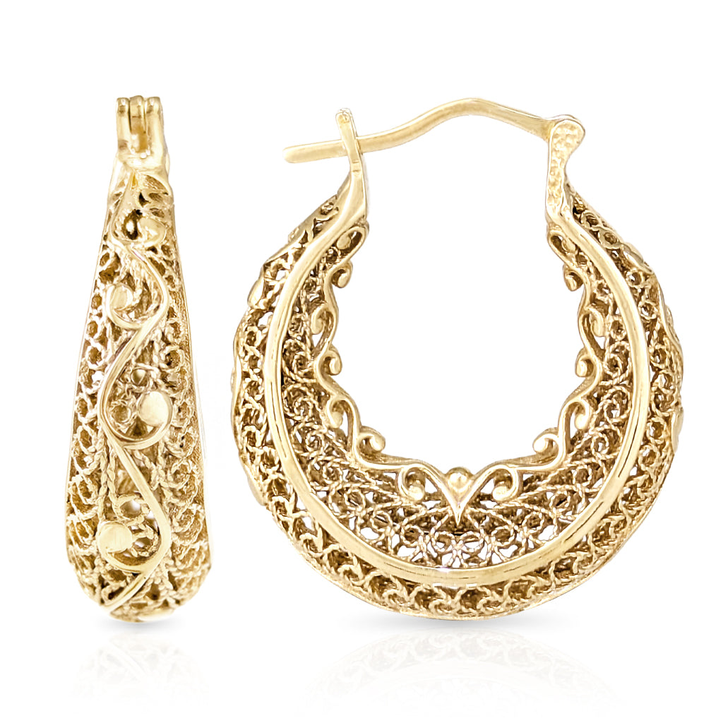 A pair of gold filigree hoop earrings, one shown from the front and the other from the side, featuring an intricate openwork design on a white background.