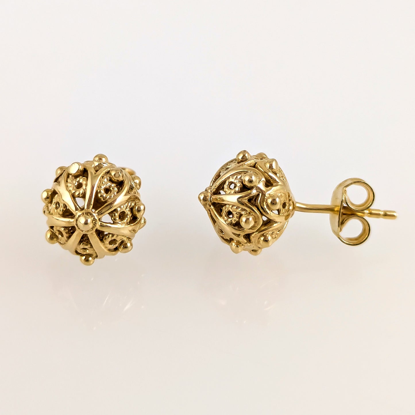 Ornate Sphere Stud Earrings with Floral Filigree Detail