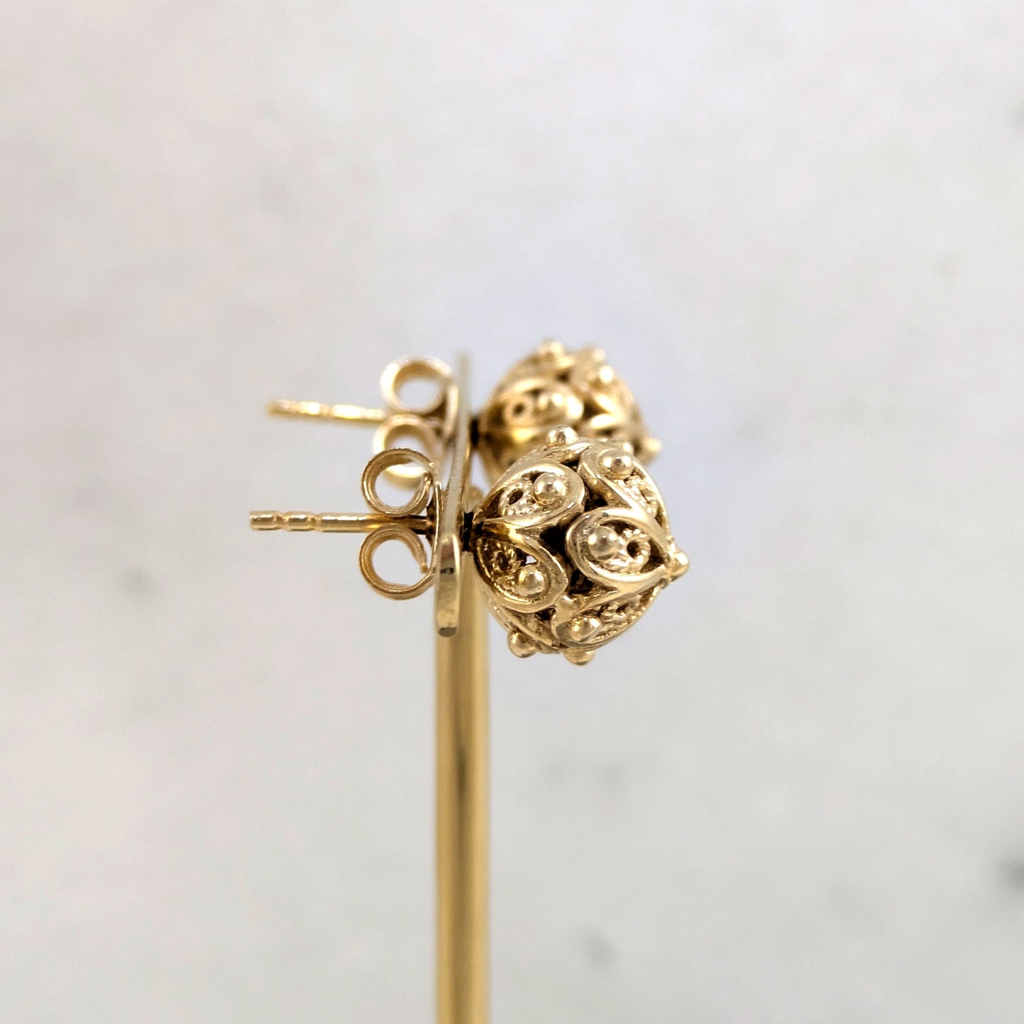 Ornate Sphere Stud Earrings with Floral Filigree Detail