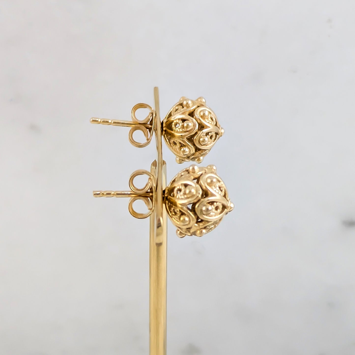 Ornate Sphere Stud Earrings with Floral Filigree Detail