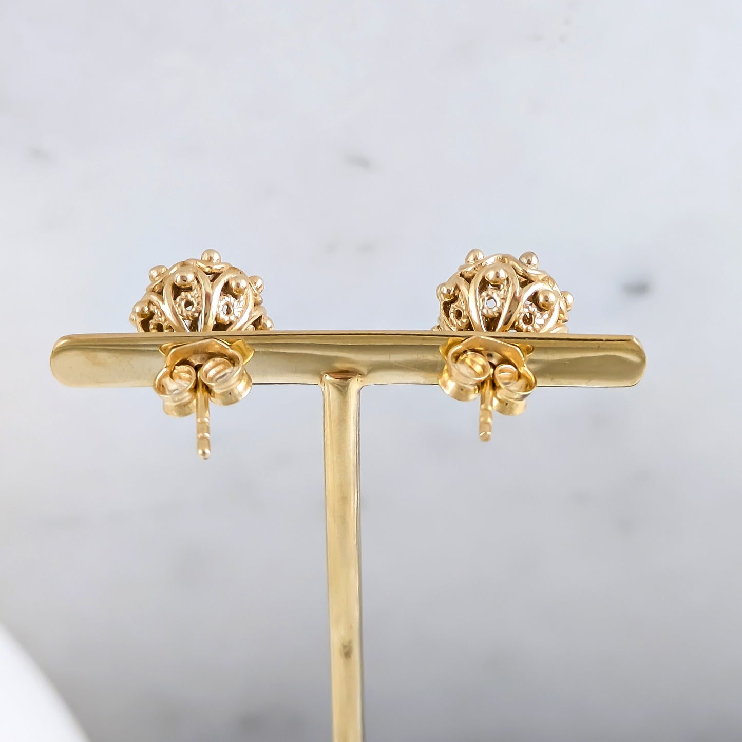 Ornate Sphere Stud Earrings with Floral Filigree Detail