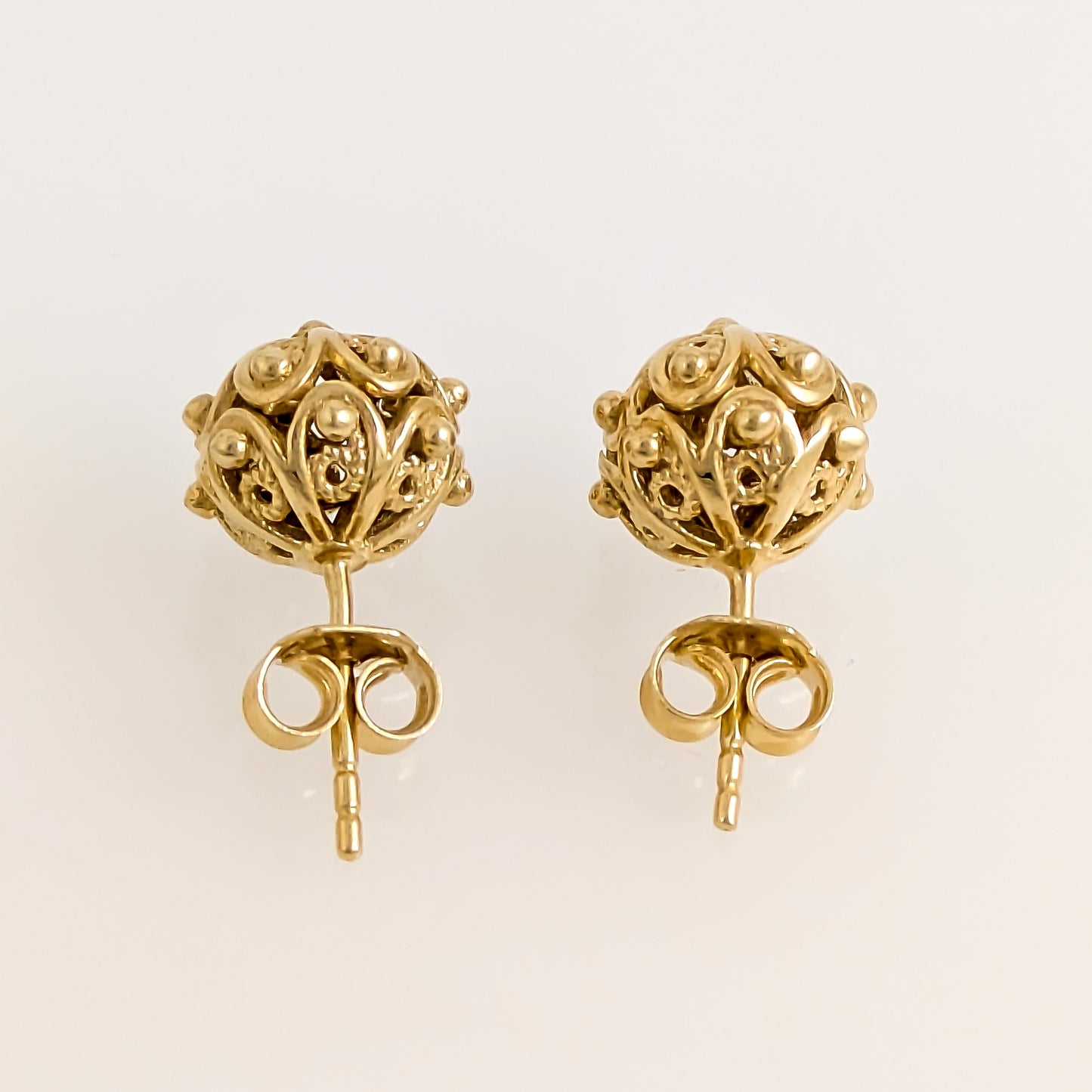 Ornate Sphere Stud Earrings with Floral Filigree Detail