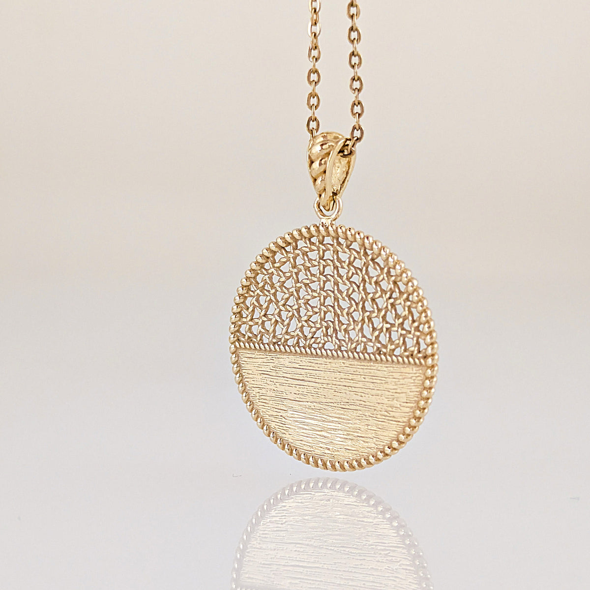 Round Openwork Pendant with Woven Lattice and Textured Detail