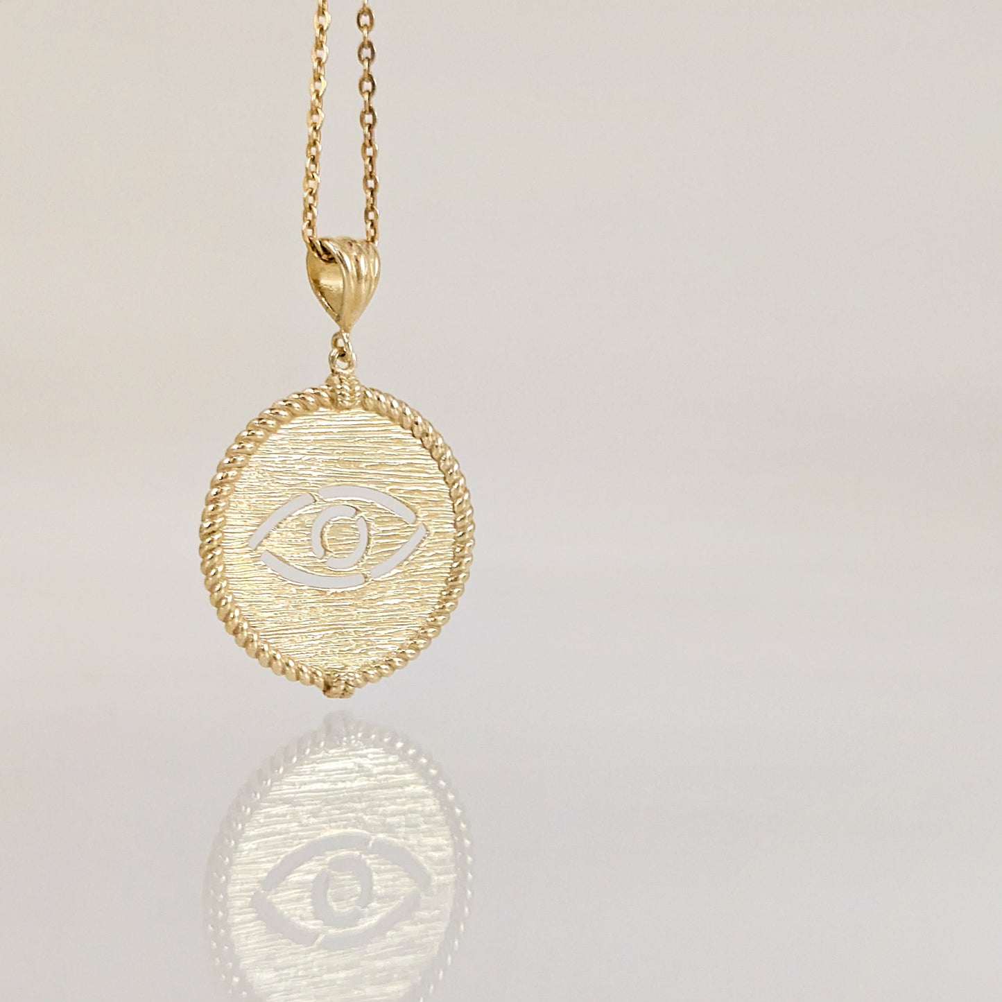 Round Evil Eye Cutout Pendant