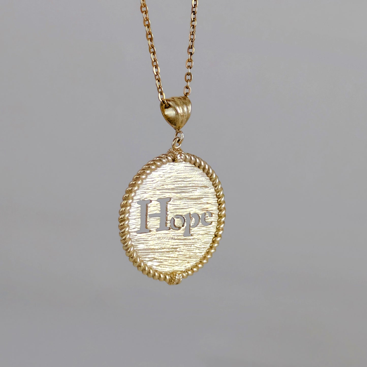 Round Hope Cutout Pendant