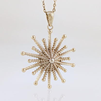 Round Starburst Pendant with Radiating Sculptural Detail
