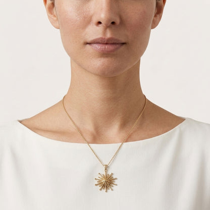 Round Starburst Pendant with Radiating Sculptural Detail