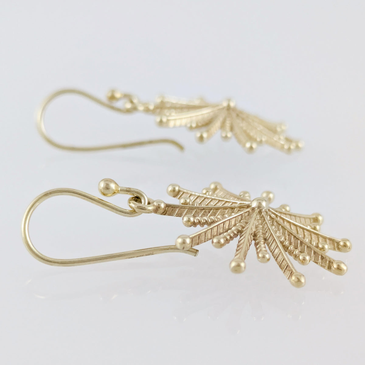 Round Starburst Drop Earrings with Radiating Sculptural Detail