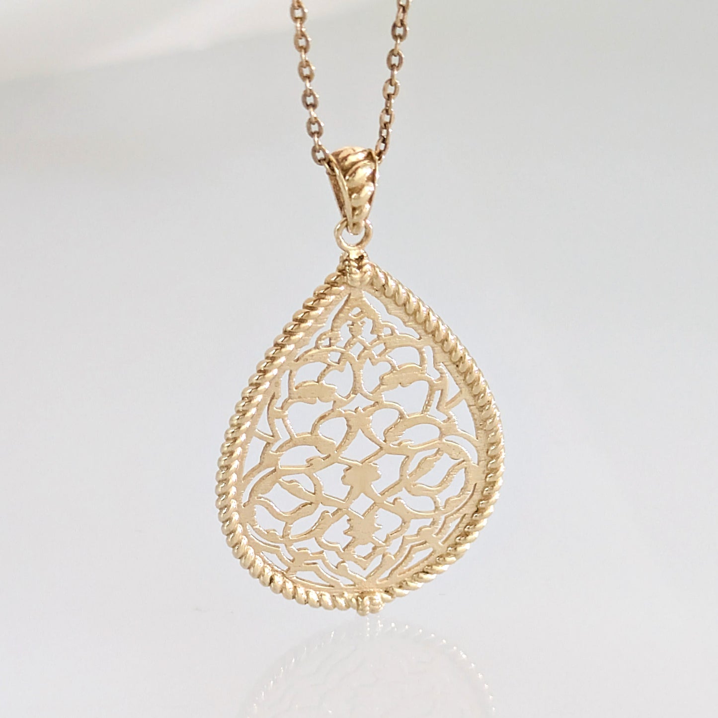 Turkish Motif Teardrop Openwork Pendant with Ornate Scrollwork