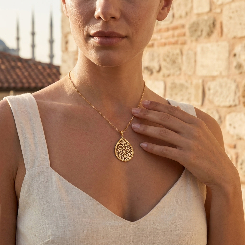 Turkish Motif Teardrop Openwork Pendant with Ornate Scrollwork