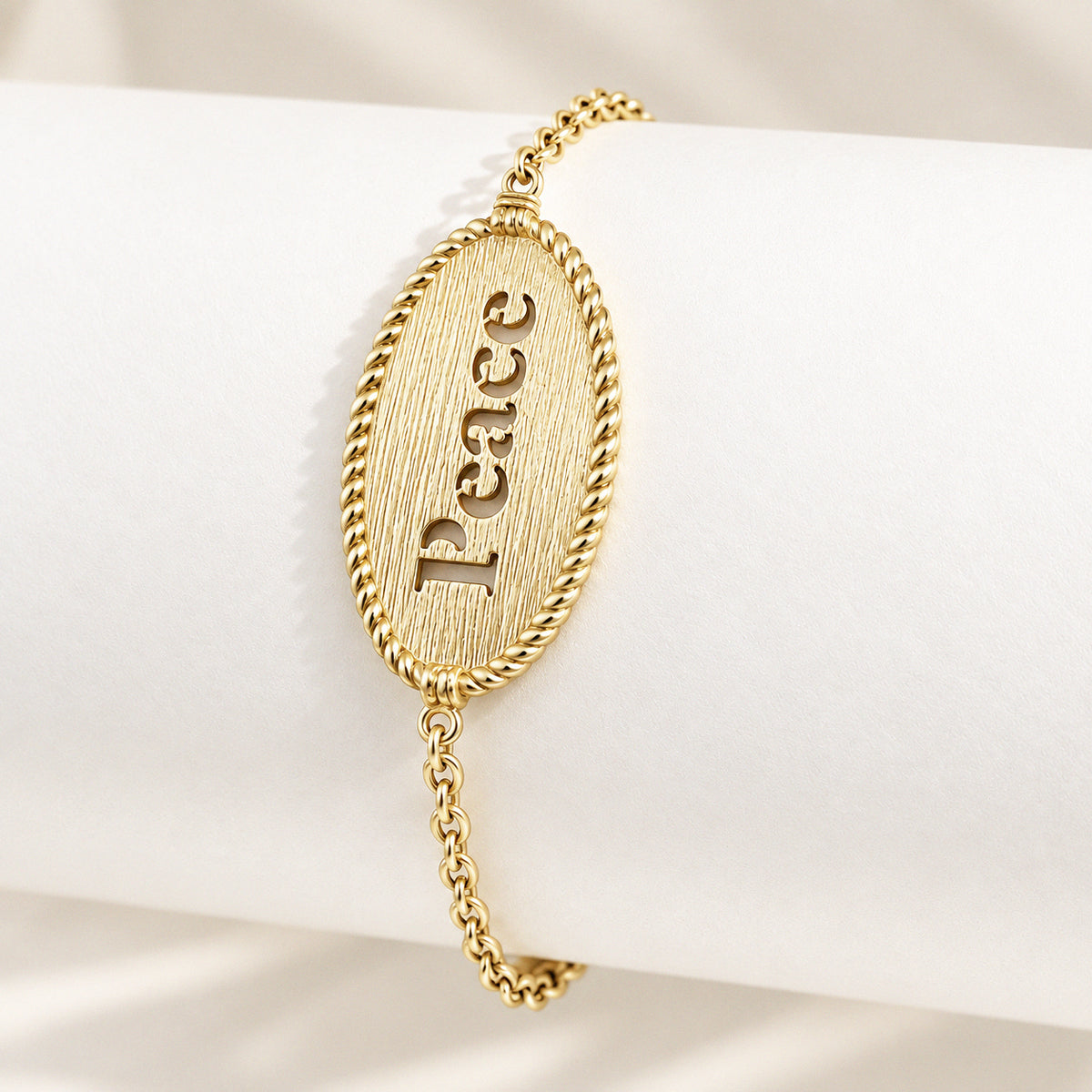 Oval Peace Cutout Bracelet with Textured Rope Border