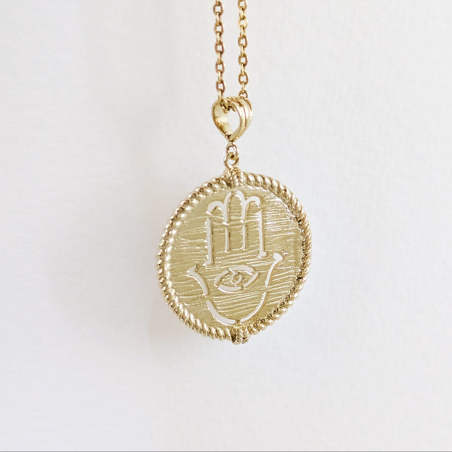 Round Hamsa Hand and Evil Eye Cutout Pendant
