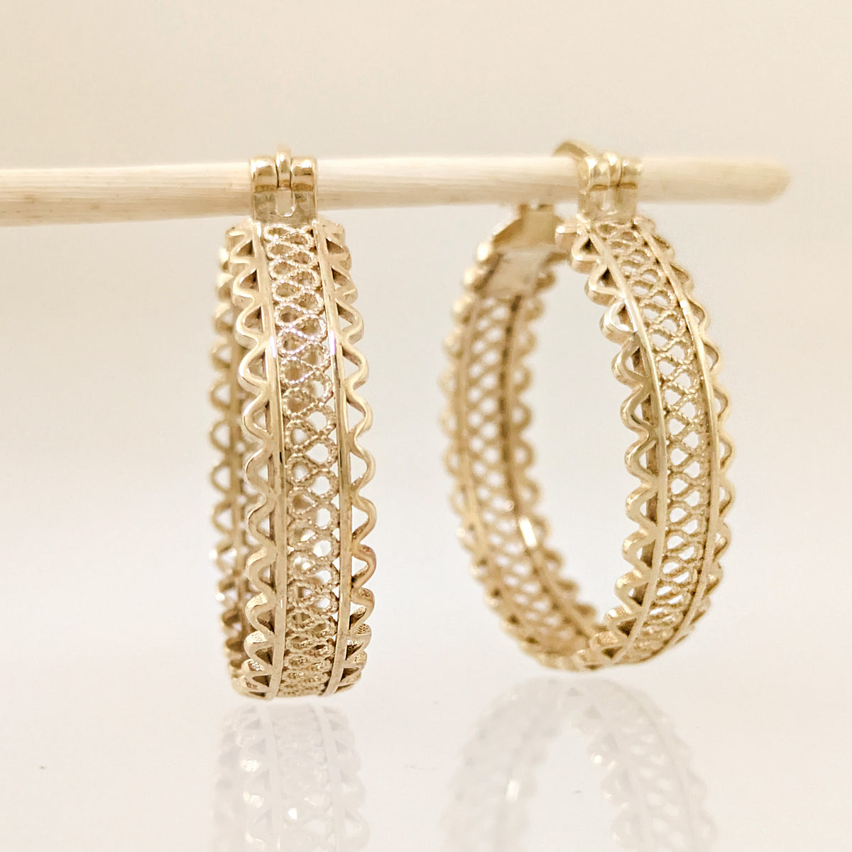 Ornate Filigree Hoop Earrings with Wavy Openwork Detail