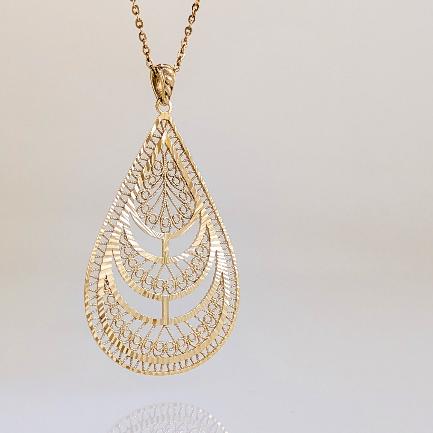 Teardrop Filigree Pendant with Layered Openwork Design