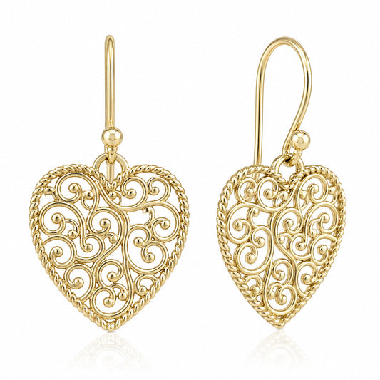 Gold heart-shaped earrings with intricate designs on a white background