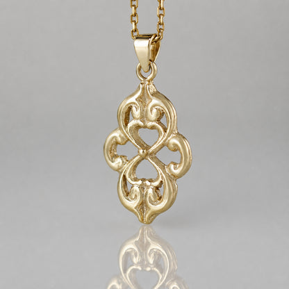 Openwork Quatrefoil Heart Scroll Pendant