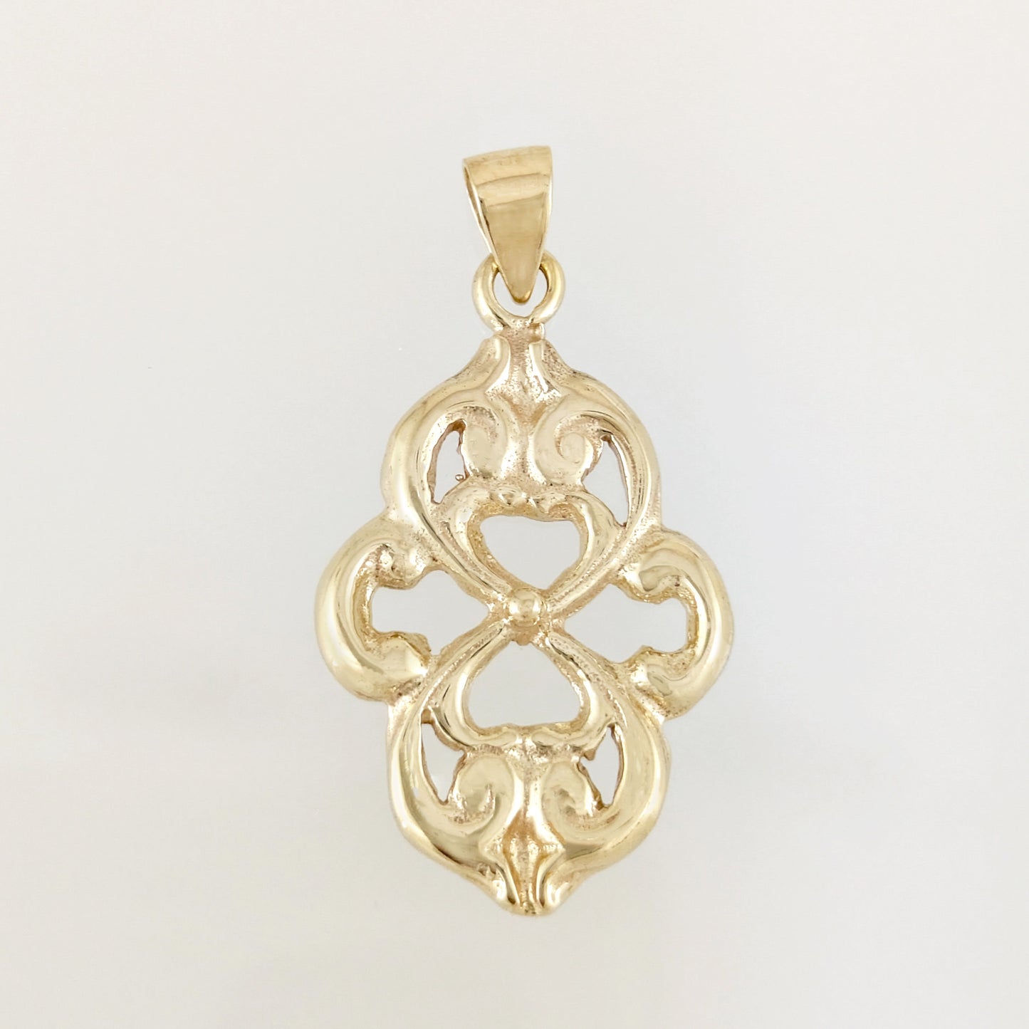 Openwork Quatrefoil Heart Scroll Pendant