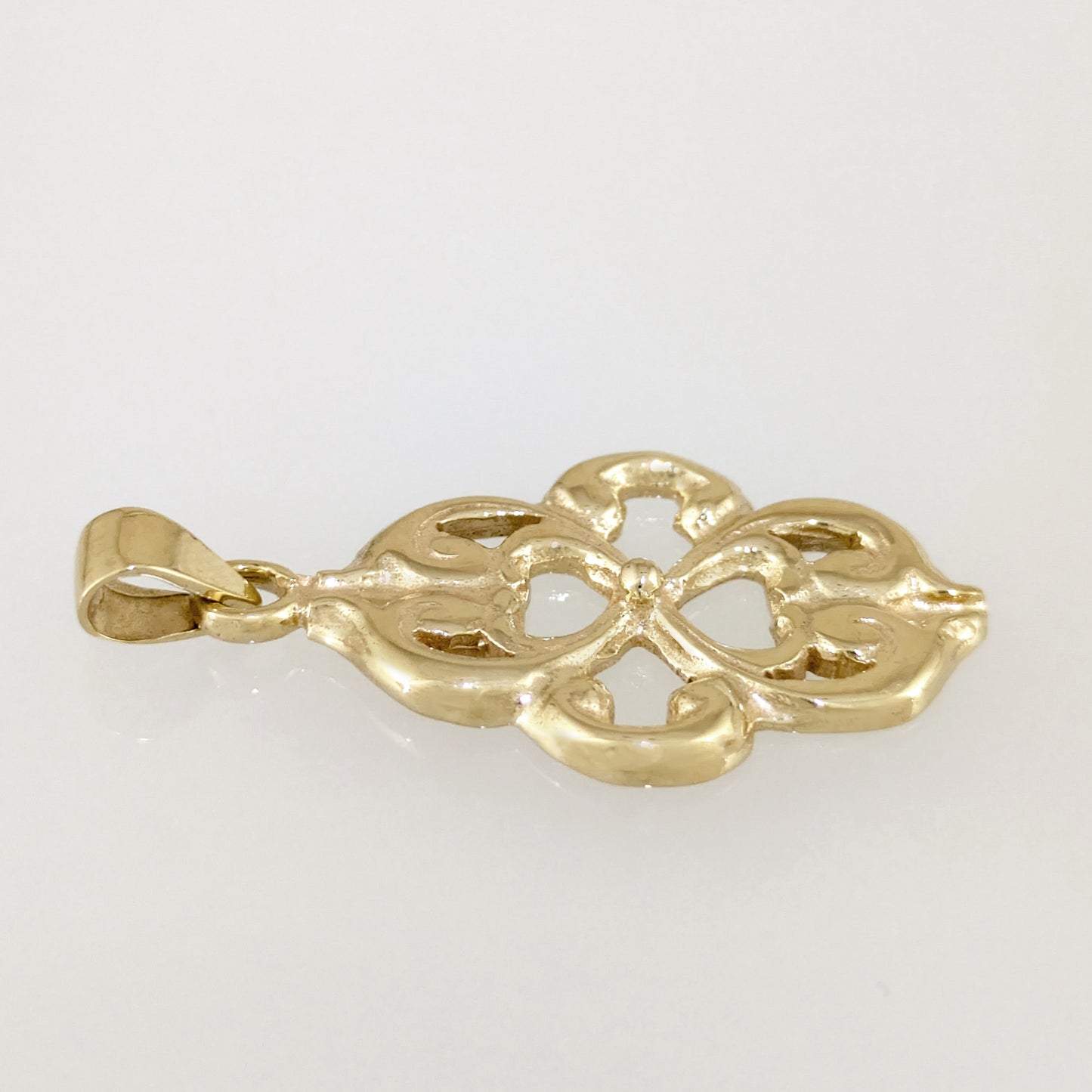 Openwork Quatrefoil Heart Scroll Pendant