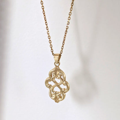 Openwork Quatrefoil Heart Scroll Pendant