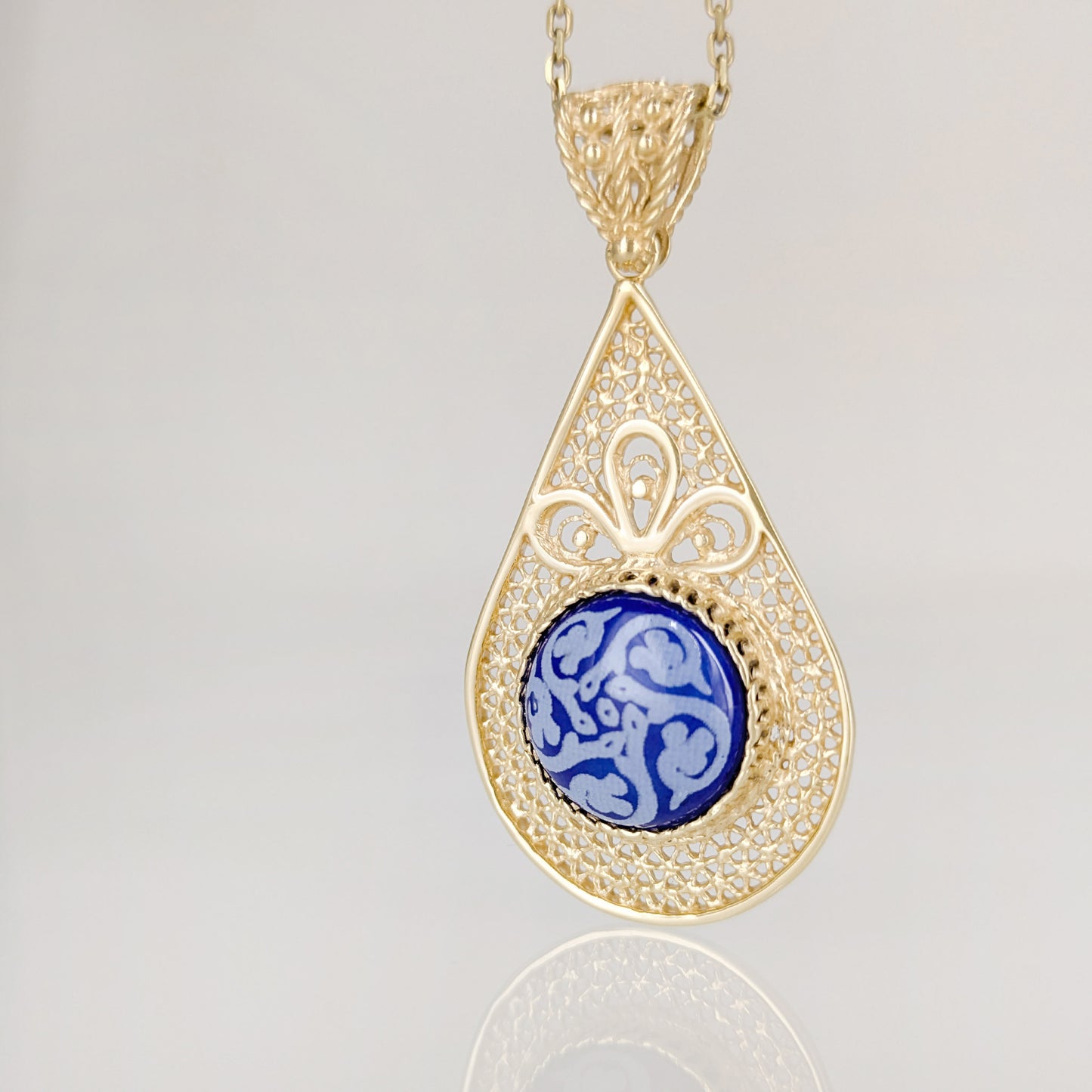 Filigree Drop Pendant with Blue Ceramic Center