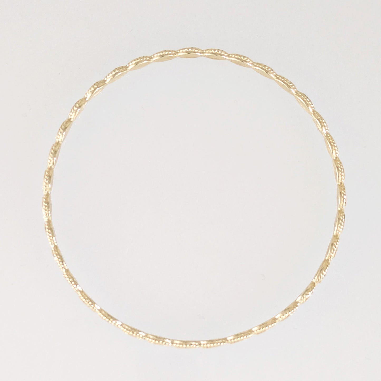 Textured Oval Link Bangle Bracelet with Sparkling Diamond Cut