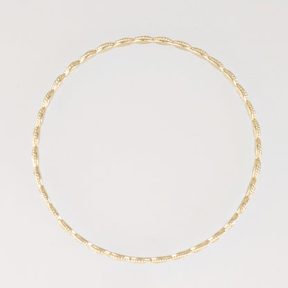 Textured Oval Link Bangle Bracelet with Sparkling Diamond Cut