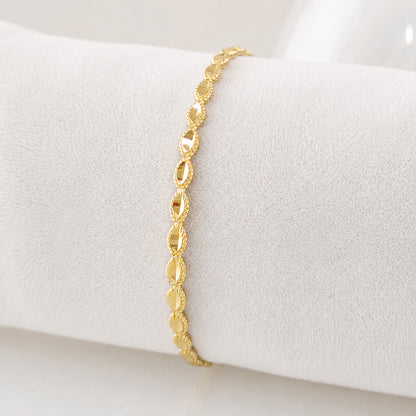 Textured Oval Link Bangle Bracelet with Sparkling Diamond Cut