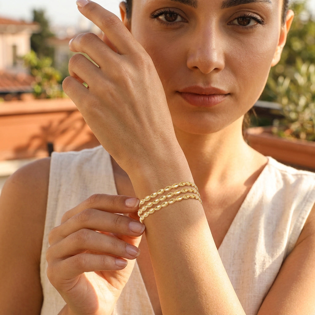 Textured Oval Link Bangle Bracelet with Sparkling Diamond Cut
