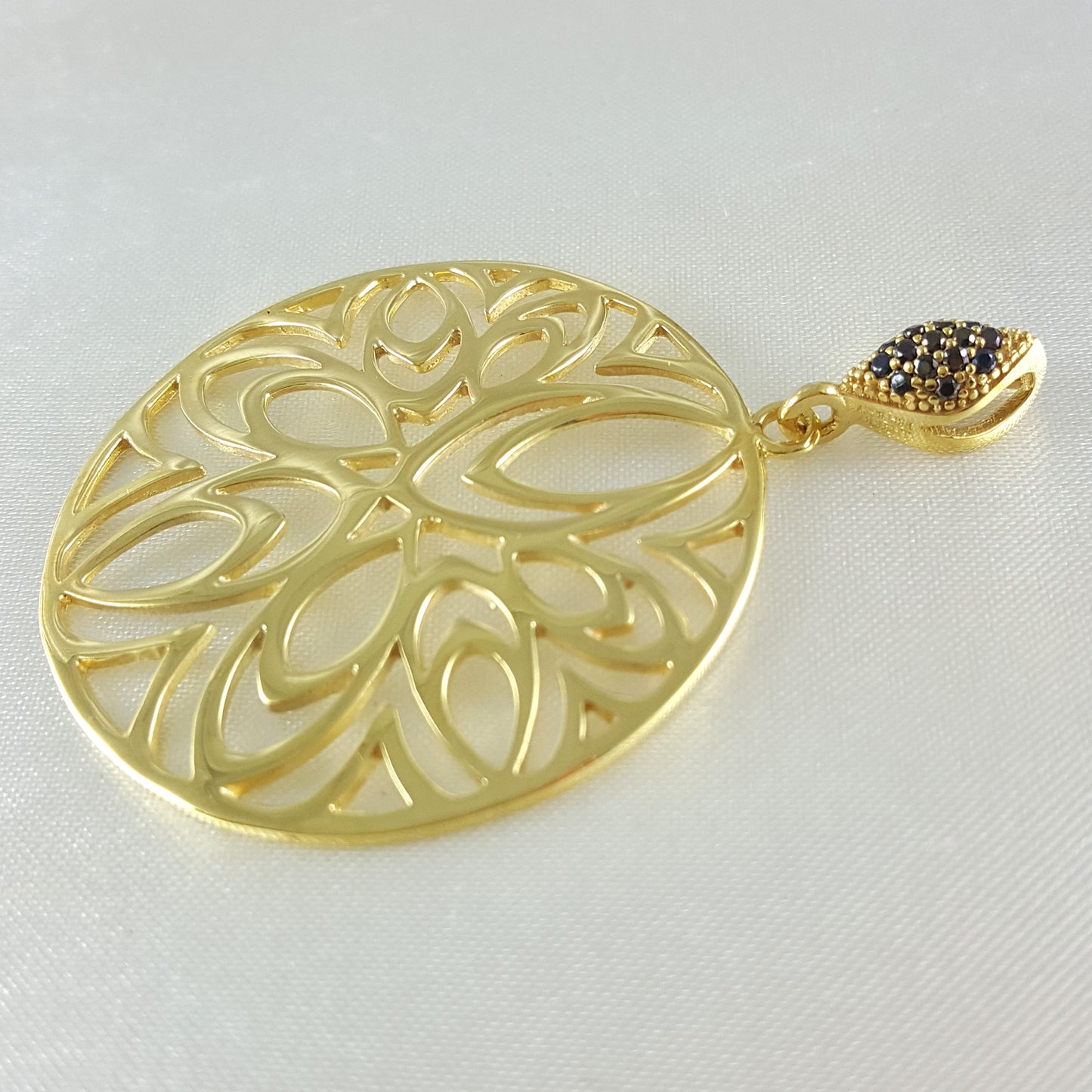 Openwork Medallion Pendant with Black Spinels