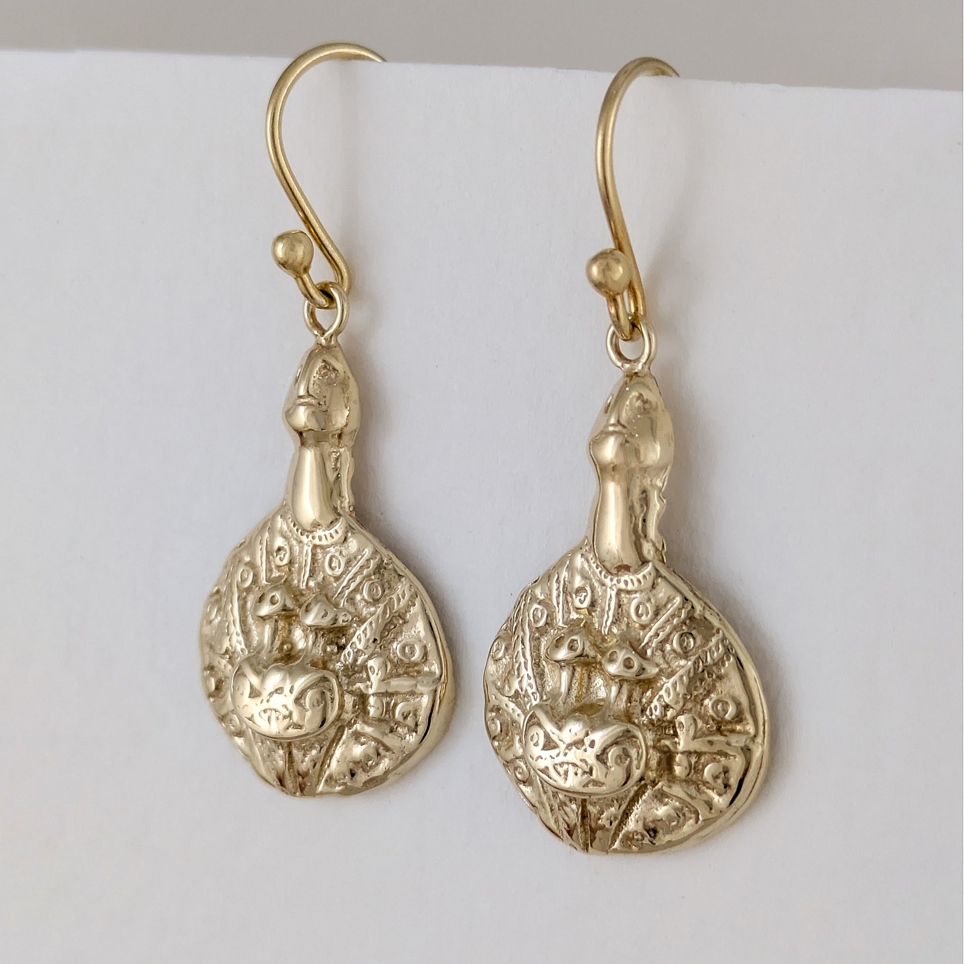 symbolic drop earrings