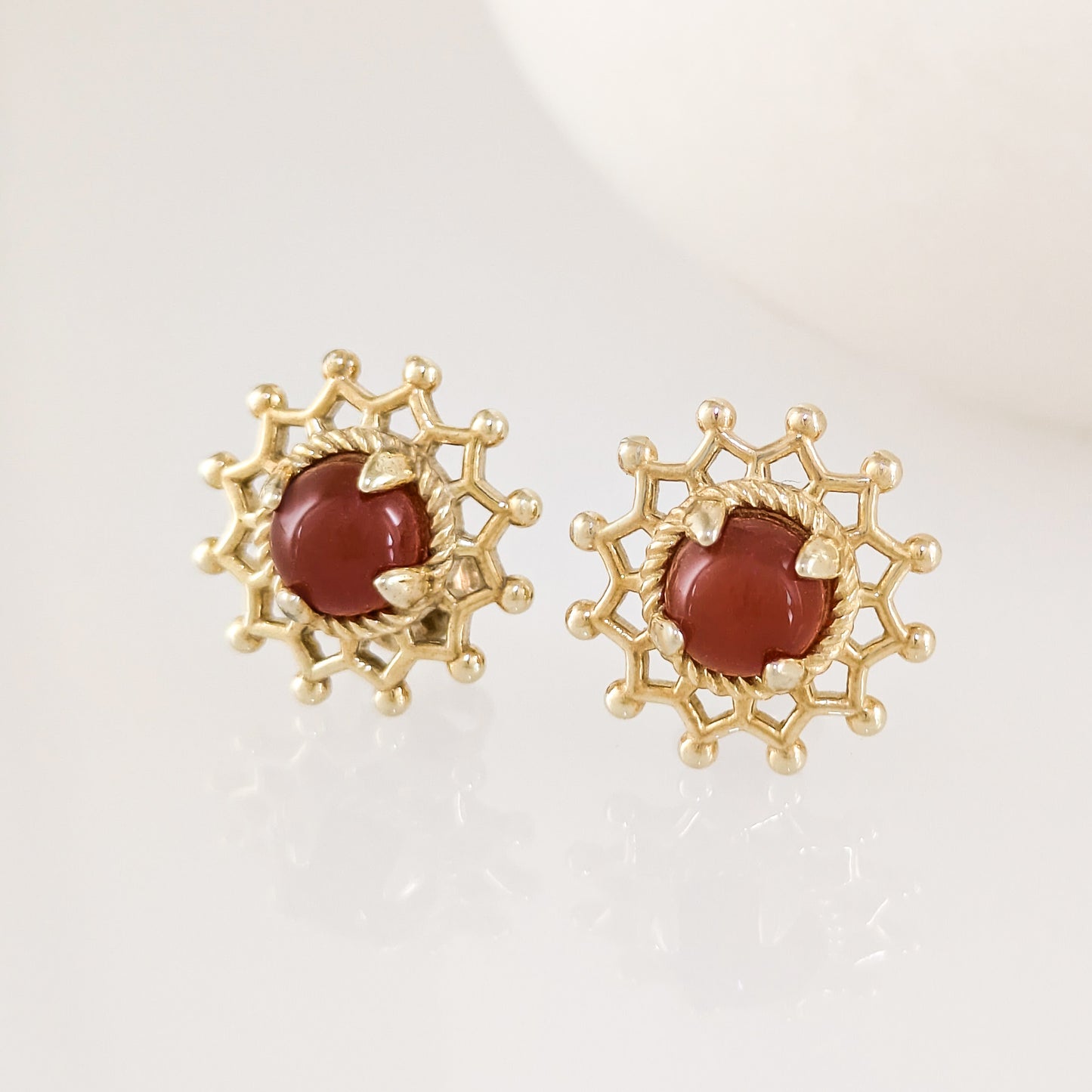 Carnelian Cabochon Stud Earrings with Ornate Openwork Design