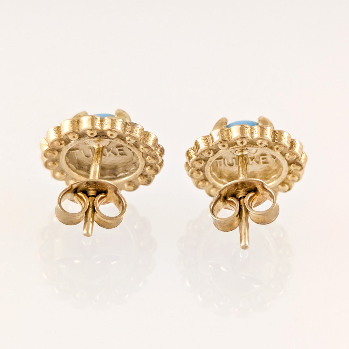 Turquoise Cabochon Stud Earrings with Ornate Floral Design