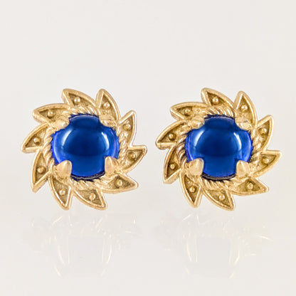 Blue Crystal Cabochon Stud Earrings with Ornate Sunburst Design