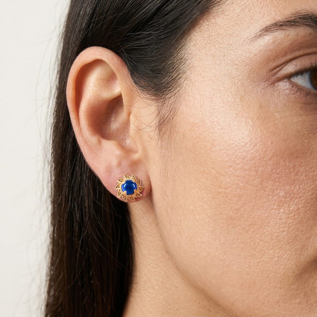 Blue Crystal Cabochon Stud Earrings with Ornate Sunburst Design