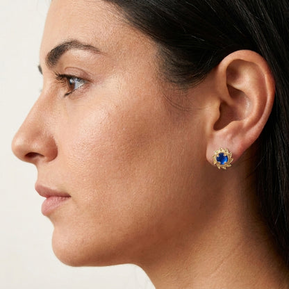 Blue Crystal Cabochon Stud Earrings with Ornate Sunburst Design