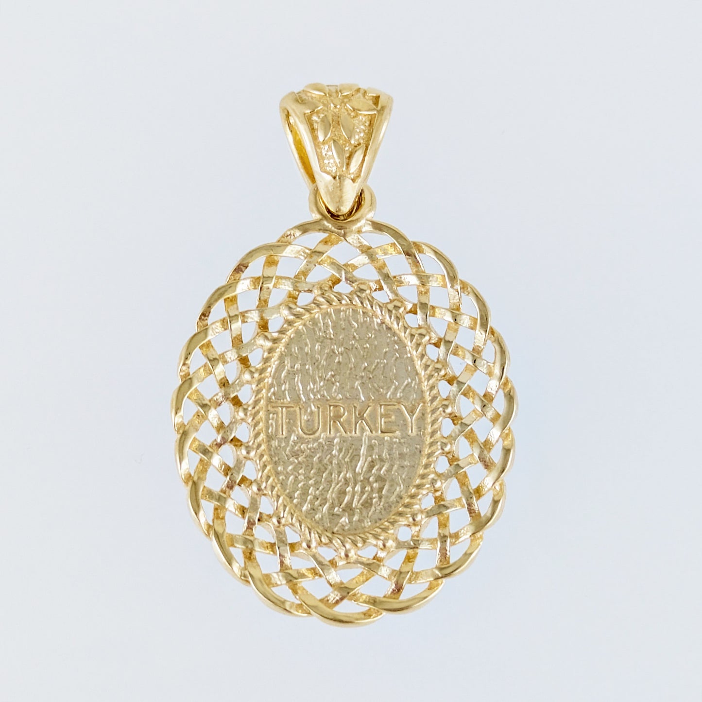 Oval Turquoise Pendant with Woven Openwork Frame