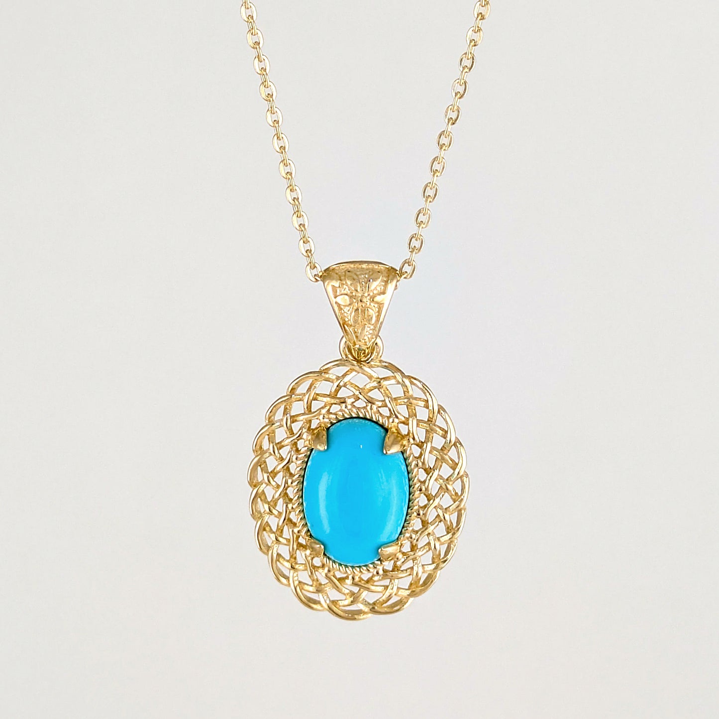 Oval Turquoise Pendant with Woven Openwork Frame
