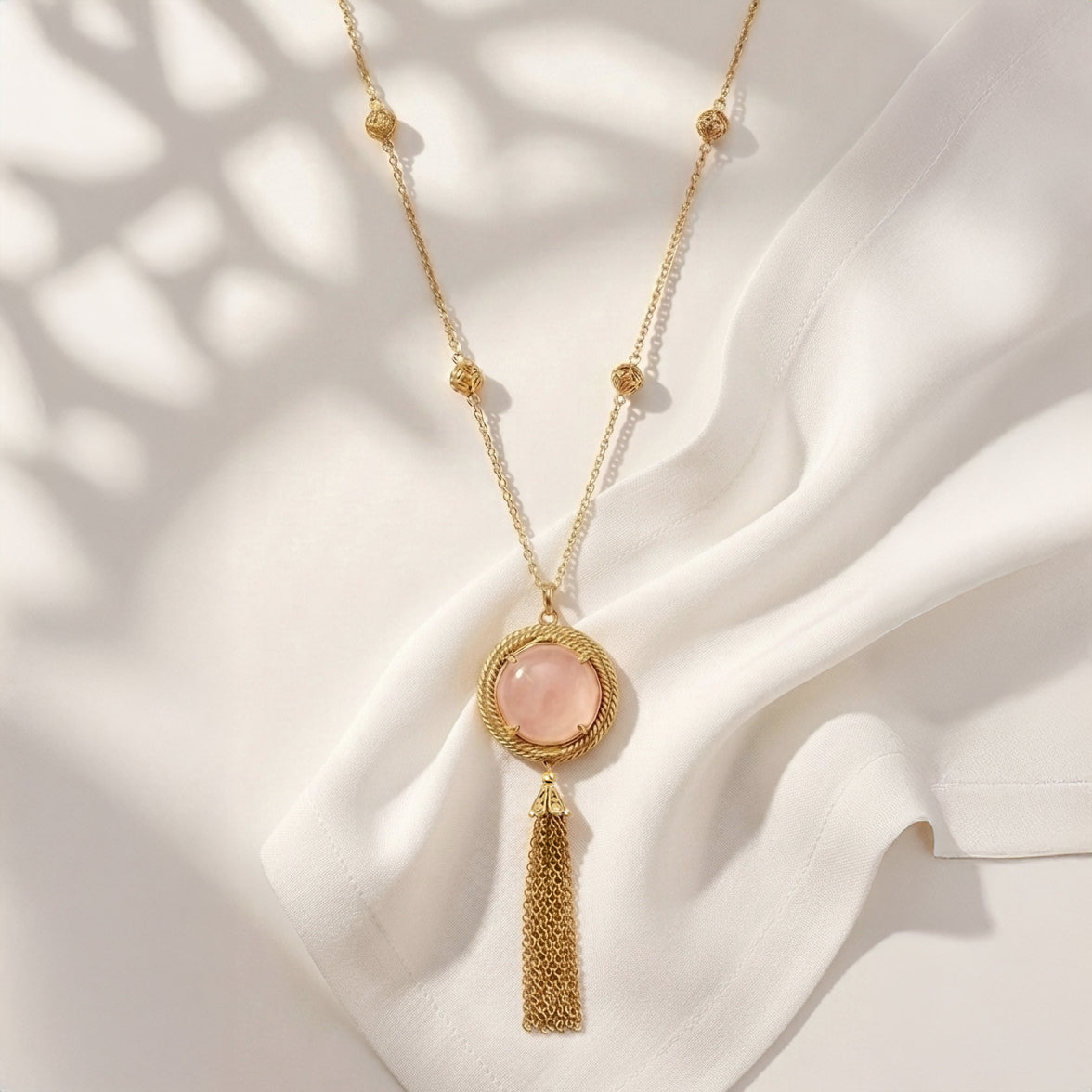 Rose Quartz Pendant Necklace with Tassel and Filigree Accents