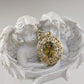Scrollwork Oval Pendant with 10x12mm Diaspore Color Quartz Gemstone