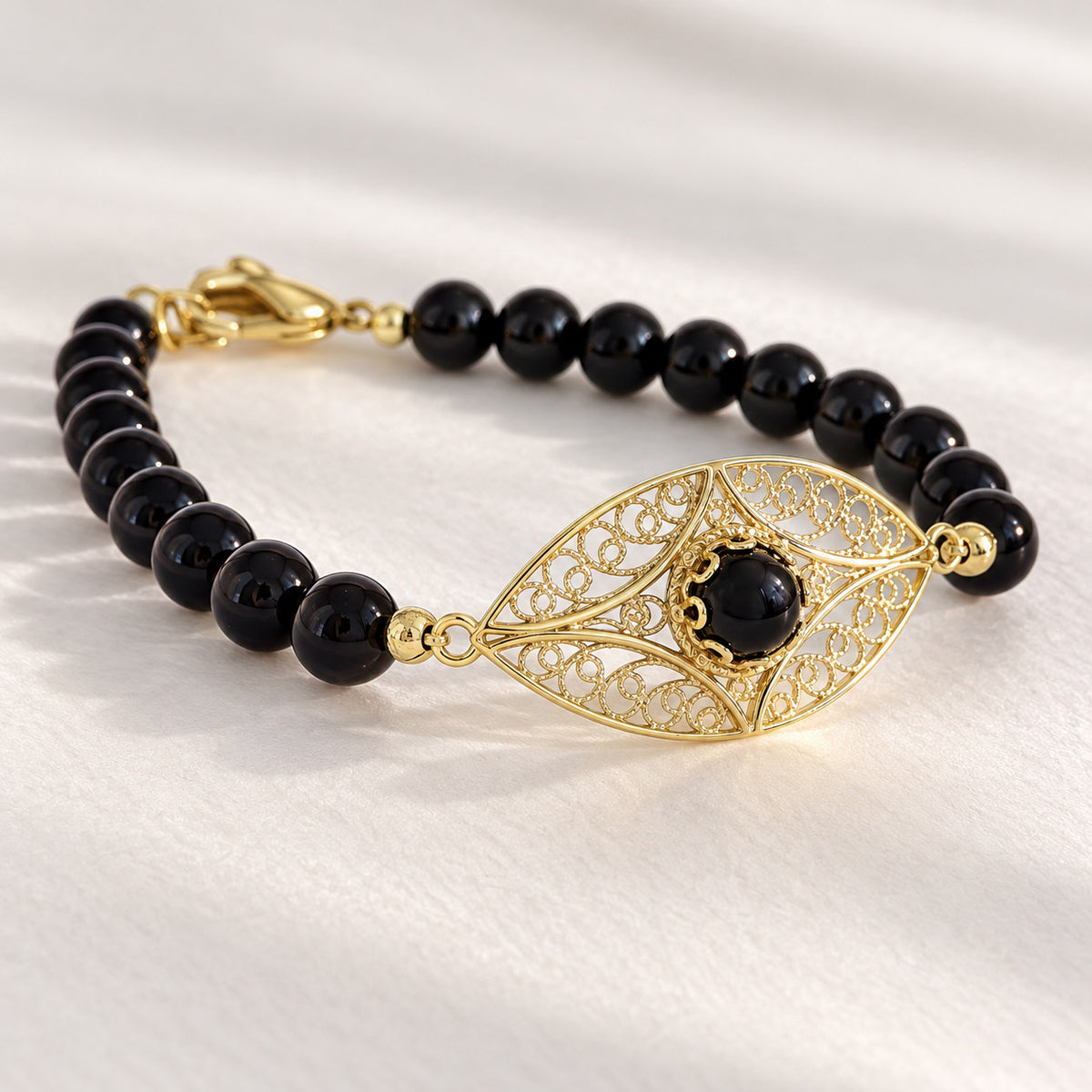 Black Onyx Filigree Bead Bracelet with Ornate Center