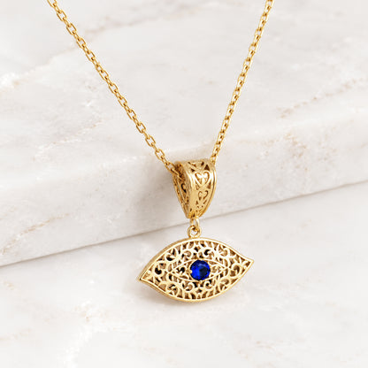 Filigree Evil Eye Pendant with Blue Crystal