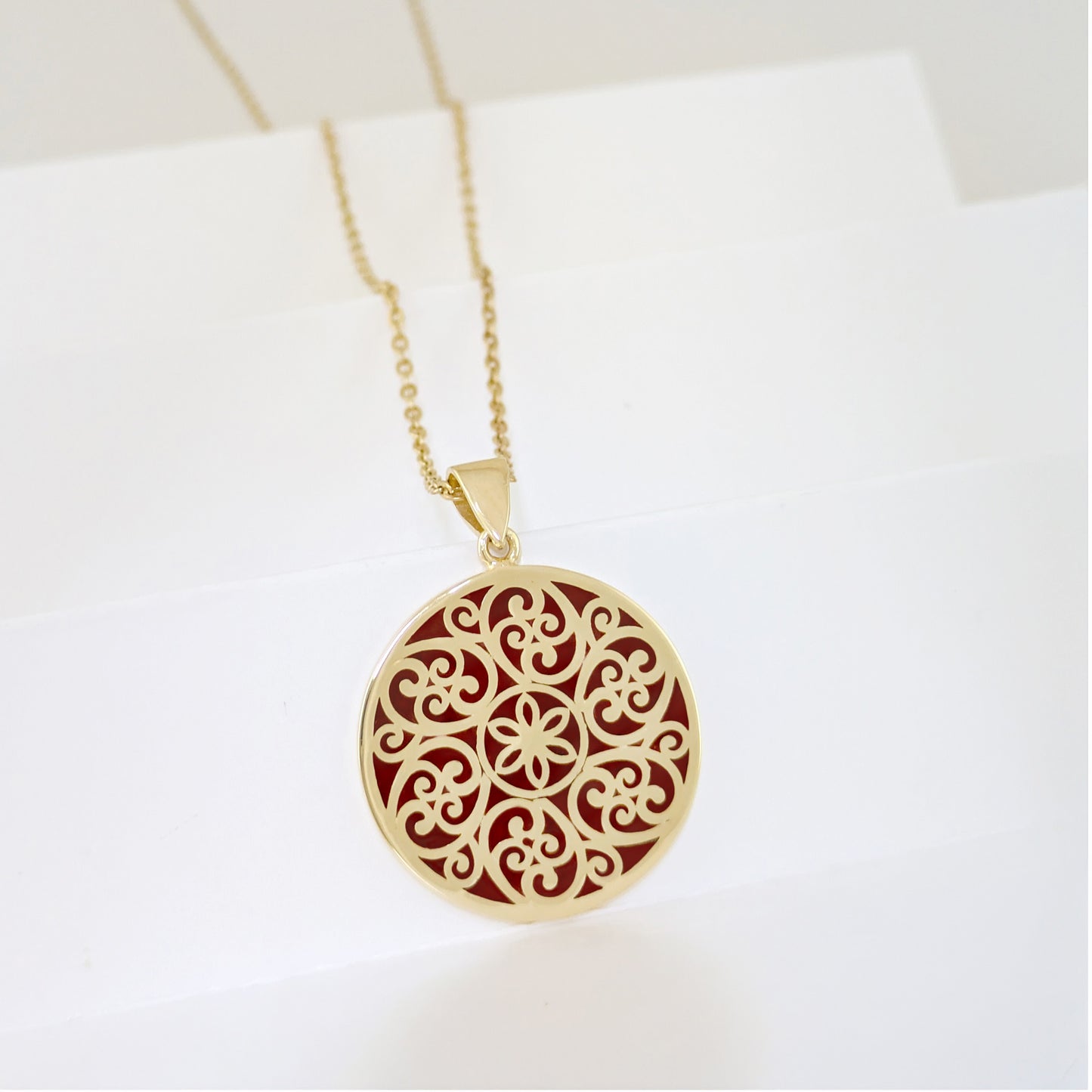Round Openwork Scroll Pendant with Burgundy Enamel